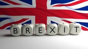 Brexit written on dices with UK flag in background, Brexit concept. SCAIR